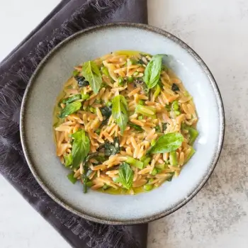 One-Pot Orzo with Snap Peas, Asparagus, and Basil recipe image