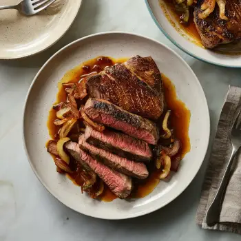 Pan-Seared Steak with Whiskey Bacon-Onion Sauce recipe image