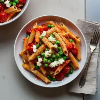 Penne Pomodoro with Ricotta and Peas recipe image